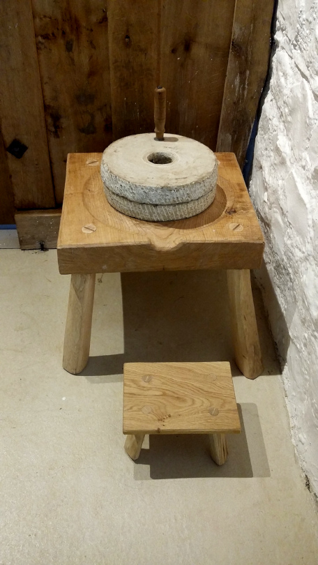 St Fagans quern stone stand